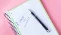 Back to school setup in pink and green colors with notebook and pen Royalty Free Stock Photo