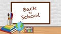 Back to school sign with board and school items Royalty Free Stock Photo