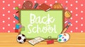 Back to school sign with board and school items Royalty Free Stock Photo
