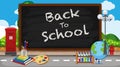 Back to school sign with many school items on the road background Royalty Free Stock Photo