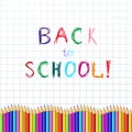 Back to school sketchy inscription on notebook sheet with wavy border of colored pencils