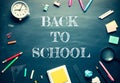 Back to school and  stationary supplies on blackboard background Royalty Free Stock Photo