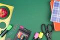 Back to school. Stationery on a green table. Office desk with copy space. Flat lay Royalty Free Stock Photo