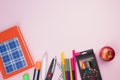 Back to school. Stationery on a pink table. Office desk with copy space. Flat lay Royalty Free Stock Photo