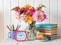 Back to school. still life with a bouquet of dahlias Royalty Free Stock Photo