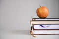 Back to school, study concept. Apple on books. Royalty Free Stock Photo