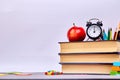 Back to school supplies. Books and red apple Royalty Free Stock Photo