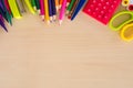 Back to school supplies, stationery accessories wooden background, Top view flat Royalty Free Stock Photo
