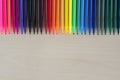 Back to school supplies, stationery colorful pens accessories on wooden background, Top view Royalty Free Stock Photo