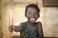 Back To School Symbol - African Girl Toothy Huge Smile Showing R Royalty Free Stock Photo