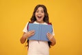 Back to school. Teenager school girl hold book and copybook ready to learn. School children with school bag on isolated Royalty Free Stock Photo