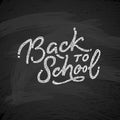 Back to school text drawing by white chalk in blackboard with school items and elements. Vector illustration banner Royalty Free Stock Photo