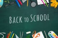 Back to school text written in chalk on a board Royalty Free Stock Photo