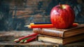 Back to School: Apple, Books, Pencils, and Empty Blackboard Royalty Free Stock Photo