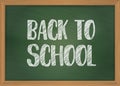 Back to school vector banner with chalk text on a blackboard with wooden frame. Vector illustration