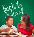 Back To School Written On Chalk Board Behind Hispanic Young Boy Royalty Free Stock Photo