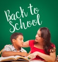 Back To School Written On Chalk Board Behind Hispanic Young Boy Royalty Free Stock Photo