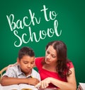 Back To School Written On Chalk Board Behind Hispanic Young Boy Royalty Free Stock Photo