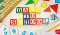 Back to school written with wooden cubicle letters