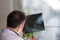 Doctor reading X-ray images Royalty Free Stock Photo