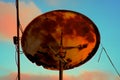 Back of a very old rusty satellite television antenna Royalty Free Stock Photo