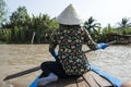 Back of vietnamese waman on the Mekong river, Vietnam Royalty Free Stock Photo