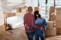 back view of african american couple looking at new home Royalty Free Stock Photo