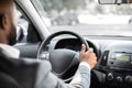 Back view of african american man in suit driving car Royalty Free Stock Photo