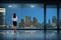 Back view of asian business woman standing looking at the city Royalty Free Stock Photo