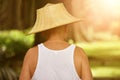 Back view of Asian male gardener. He wears a hat for sun protect Royalty Free Stock Photo