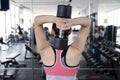 Back View of Asian Woman Exercise with Dumbell