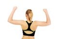 Back view of athletic woman showing muscles