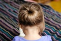 Back view of baby girl, Child girl first hair style - ponytiny t