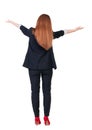 Back view of beautiful business woman welcomes. Royalty Free Stock Photo