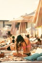 back view of beautiful girl in bikini with wet hair on the beach Royalty Free Stock Photo