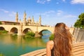 Back view beautiful woman enjoying landscape in Zaragoza, Spain