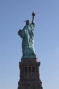 Back view behind the Statue of Liberty and pedestal in New York City Royalty Free Stock Photo