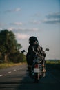 back view of bikers in helmets riding motorcycle Royalty Free Stock Photo