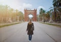 Back view of blonde woman with Arc de Triomf in Barcelona in background Royalty Free Stock Photo