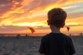 Back view boy kite sunset. Generate Ai Royalty Free Stock Photo