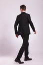 Back view of business man walking Royalty Free Stock Photo