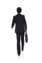Back view of a business man walking