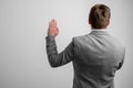 Back view of business man wearing business clothes taking oath Royalty Free Stock Photo