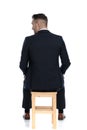 Back view of a businessman looking over his shoulder Royalty Free Stock Photo