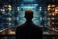 Back view of businessman working on computer with binary code. Mixed media, Software engineer utilizing a computer in a modern Royalty Free Stock Photo