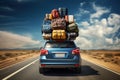 Back view of a car with luggage on the roof. Car on the road with a lot of suitcases on roof. Family travel on vacation. Royalty Free Stock Photo