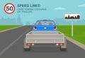 Back view of a car towing caravan or trailer in built-up area or living street. Speed limit. Driving a car.
