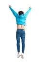 Back view of casual man in blue hoodie jumping in the air Royalty Free Stock Photo