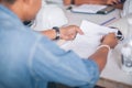 Back view of construction worker reading document Royalty Free Stock Photo