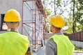 back view of cottage builders in